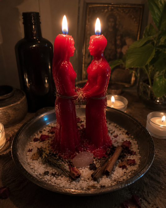 Rekindle Love Spell ritual with red couple candles, rose petals, salt, cinnamon and candlelight for restoring love and reunion energy