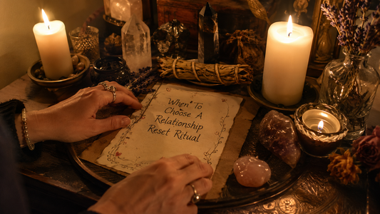 Couple holding hands at a table, reflecting on when to choose a relationship reset ritual for a healthier connection
